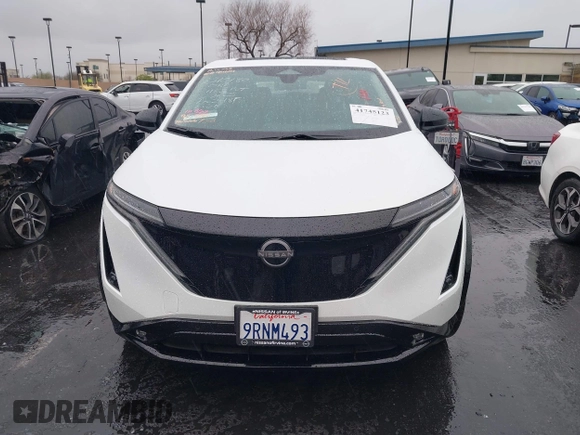 2024 Nissan ARIYA Evolve+ z VIN JN1BF0BAXRM435453, wystawiony jako IAAI lot #41745123 z przebiegiem 5 565 mil mil oraz . Historia ofert i sprzedaży dostępna na DreamBid. Obrazek 13.