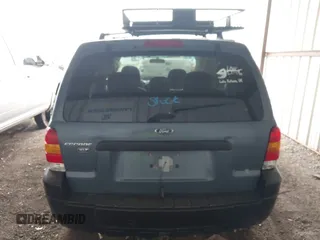 2006 Ford Escape XLT z VIN 1FMCU93126KB09191, wystawiony jako IAAI lot #41700899 z przebiegiem 123 345 mil mil oraz . Historia ofert i sprzedaży dostępna na DreamBid. Obrazek 16.