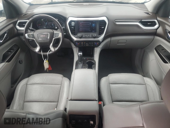 2017 GMC Acadia SLT with VIN 1GKKNMLS1HZ231936, listed as a Copart auction lot 58483905 with 153,001 mi miles and Salvage title. Bid and sale history available at DreamBid. Image 8.