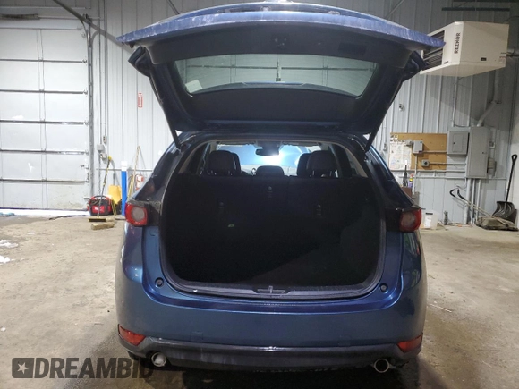 2018 Mazda CX-5 Grand Touring with VIN JM3KFBDM1J0304706, listed as a Copart auction lot 46123415 with 104,004 mi miles and Salvage title. Bid and sale history available at DreamBid. Image 6.