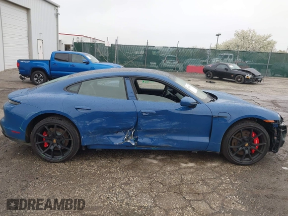 2022 Porsche Taycan GTS z VIN WP0AD2Y17NSA59692, wystawiony jako IAAI lot #41961572 z przebiegiem 12 680 mil mil oraz . Historia ofert i sprzedaży dostępna na DreamBid. Obrazek 6.