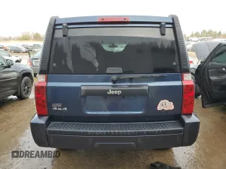 2010 Jeep Commander Sport with VIN 1J4RG4GK5AC119433, listed as a Copart auction lot 87657265 with 212,973 mi miles and Salvage title. Bid and sale history available at DreamBid. Image 6.