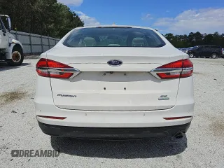 2019 Ford Fusion SE with VIN 3FA6P0HD4KR145810, listed as a Copart auction lot 45312765 with 137,414 mi miles and Clean Title. Bid and sale history available at DreamBid. Image 6.