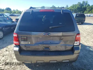 2011 Ford Escape XLT z VIN 1FMCU9D78BKC35522, wystawiony jako Copart lot #65952115 z przebiegiem 130 875 mil mil oraz Czysty tytuł • Clean title. Historia ofert i sprzedaży dostępna na DreamBid. Obrazek 6.