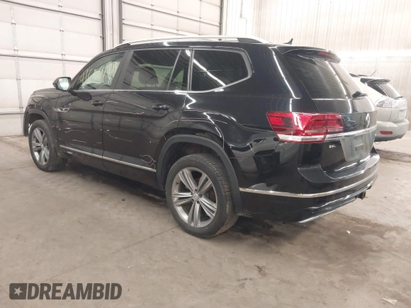 2018 Volkswagen Atlas SEL z VIN 1V2RR2CAXJC548261, wystawiony jako IAAI lot #41650478 z przebiegiem 123 399 mil mil oraz . Historia ofert i sprzedaży dostępna na DreamBid. Obrazek 3.