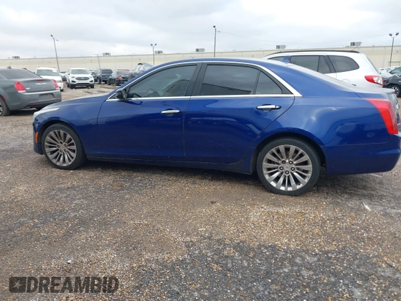 2014 Cadillac CTS Luxury RWD with VIN 1G6AR5SX9E0155626, listed as a IAAI auction lot 41271029 with 99,038 mi miles. Bid and sale history available at carsss.com. Image 14.