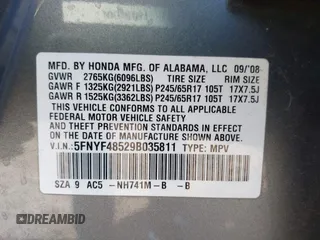 2009 Honda Pilot EX-L with VIN 5FNYF48529B035811, listed as a IAAI auction lot 41883686 with 173,830 mi miles. Bid and sale history available at carsss.com. Image 9.