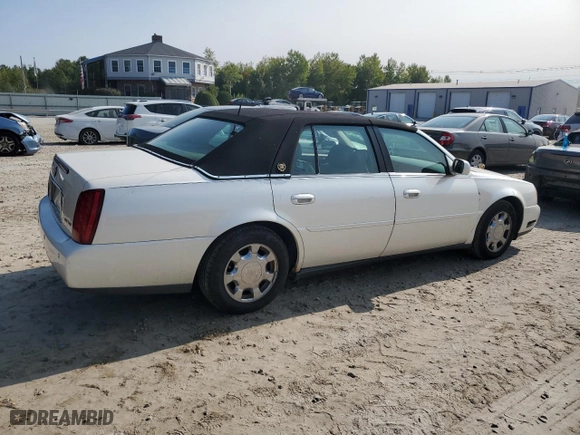 2001 Cadillac DeVille with VIN 1G6KD54YX1U158322, listed as a Copart auction lot 71097694 with 64,731 mi miles and Clean Title. Bid and sale history available at carsss.com. Image 3.