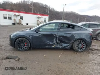 2024 Tesla Model Y Performance with VIN 7SAYGDEF7RF020203, listed as a IAAI auction lot 41639077 with 14,493 mi miles and . Bid and sale history available at DreamBid. Image 14.