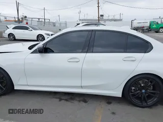 2021 BMW 3 Series 330i z VIN 3MW5R1J04M8C06043, wystawiony jako IAAI lot #42109872 z przebiegiem 62 325 mil mil oraz . Historia ofert i sprzedaży dostępna na DreamBid. Obrazek 14.