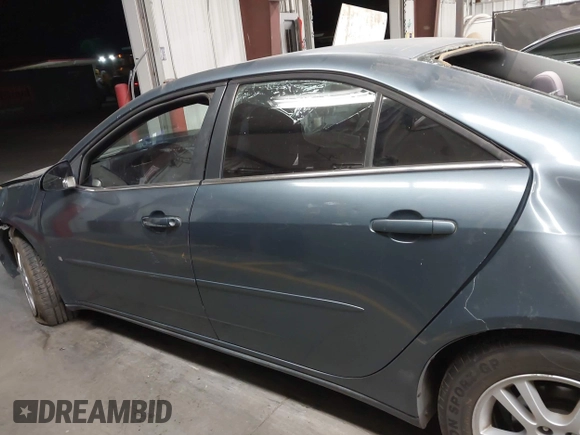 2006 Pontiac G6 6-Cyl z VIN 1G2ZG558464257988, wystawiony jako IAAI lot #42499674 z przebiegiem Nie podano mil oraz . Historia ofert i sprzedaży dostępna na DreamBid. Obrazek 15.