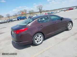 2011 Kia Optima EX with VIN KNAGN4A7XB5055304, listed as a IAAI auction lot 42023759 with 158,385 mi miles. Bid and sale history available at carsss.com. Image 4.