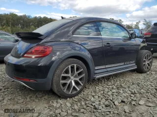 2018 Volkswagen Beetle Dune with VIN 3VWSD7AT4JM709024, listed as a Copart auction lot 73713754 with 50,879 mi miles and Salvage Title. Bid and sale history available at carsss.com. Image 3.