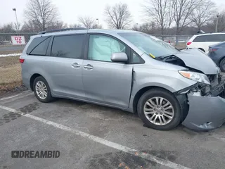 2016 Toyota Sienna XLE with VIN 5TDYK3DC3GS708043, listed as a IAAI auction lot 41349237 with 126,226 mi miles. Bid and sale history available at carsss.com. Image 1.