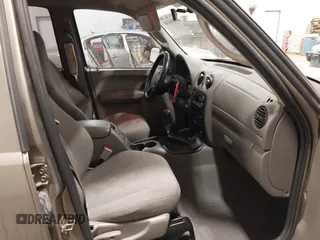 2003 Jeep Liberty Sport with VIN 1J4GL48K83W652993, listed as a IAAI auction lot 41086140 with 115,177 mi miles and . Bid and sale history available at DreamBid. Image 5.
