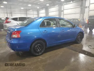2009 Toyota Yaris with VIN JTDBT903991315725, listed as a Copart auction lot 52566735 with 177,044 mi miles and Salvage Title. Bid and sale history available at DreamBid. Image 3.