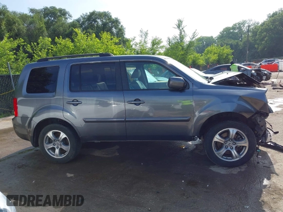 2013 Honda Pilot EX-L with VIN 5FNYF3H59DB038966, listed as a IAAI auction lot 42461394 with 142,684 mi miles and . Bid and sale history available at DreamBid. Image 14.