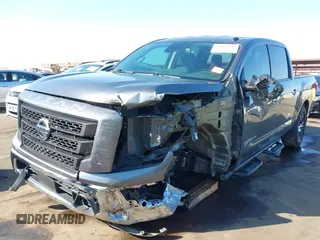 2021 Nissan Titan SV with VIN 1N6AA1EF2MN504611, listed as a IAAI auction lot 41469990 with 81,432 mi miles and . Bid and sale history available at DreamBid. Image 6.