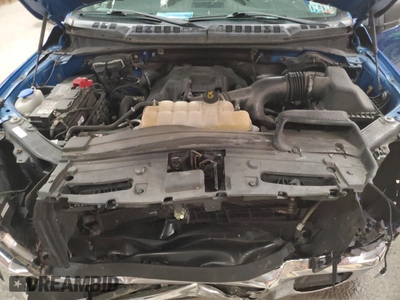 2015 Ford F-150 XLT with VIN 1FTEX1EP6FFC20794, listed as a Copart auction lot 60550415 with 101,324 mi miles and Salvage title. Bid and sale history available at DreamBid. Image 11.