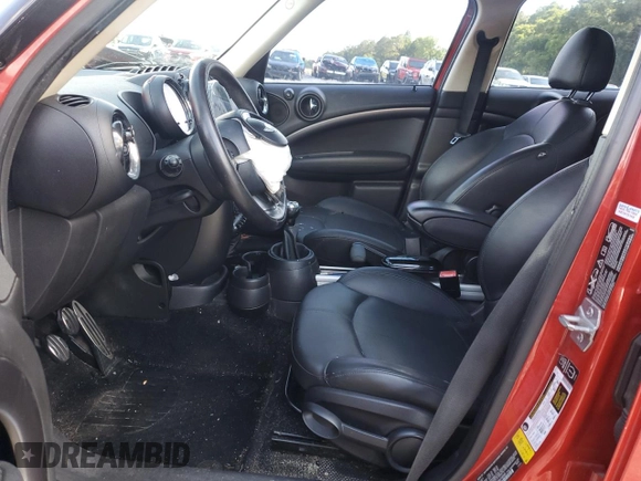 2013 MINI Countryman S ALL4 with VIN WMWZC5C53DWM16045, listed as a Copart auction lot 56057555 with 167,263 mi miles and Salvage title. Bid and sale history available at DreamBid. Image 7.