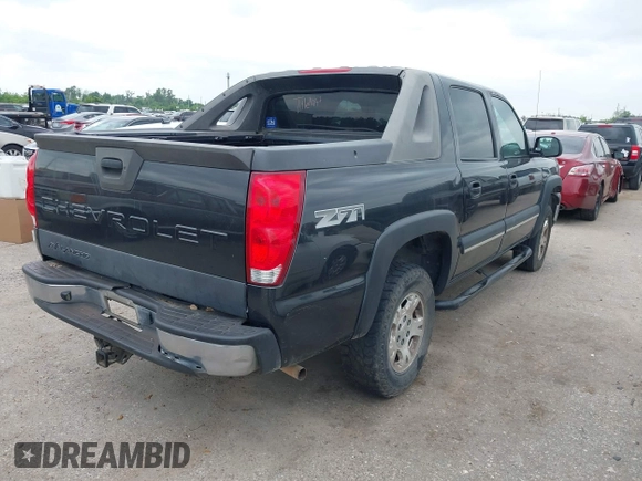 2003 Chevrolet Avalanche with VIN 3GNEK13TX3G311583, listed as a IAAI auction lot 42032187 with 301,008 mi miles. Bid and sale history available at carsss.com. Image 4.
