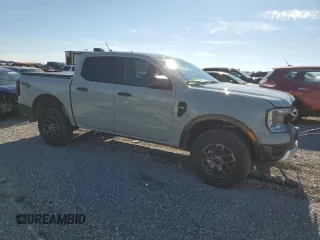 2024 Ford Ranger XLT with VIN 1FTER4HHXRLE20468, listed as a Copart auction lot 79519994 with 9,386 mi miles and Salvage title. Bid and sale history available at DreamBid. Image 4.