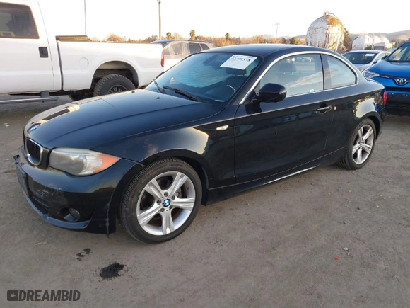 2013 BMW 1 Series 128i with VIN WBAUP9C53DVS95917, listed as a IAAI auction lot 41398338 with 52,160 mi miles. Bid and sale history available at carsss.com. Image 2.