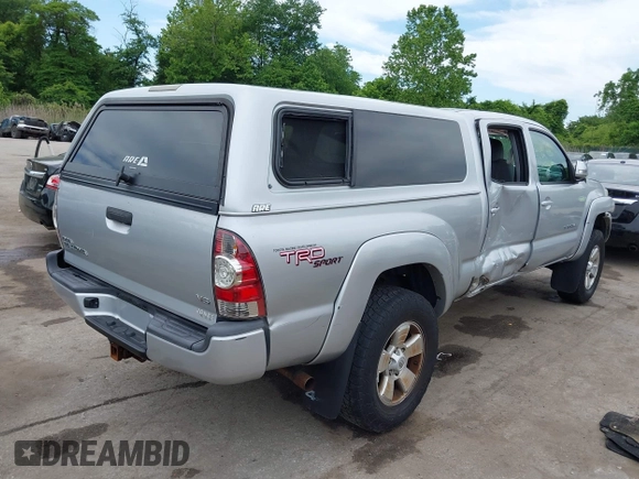 2013 Toyota Tacoma with VIN 3TMMU4FN1DM055477, listed as a IAAI auction lot 42306479 with 191,792 mi miles and . Bid and sale history available at DreamBid. Image 4.