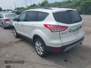 2013 Ford Escape SEL with VIN 1FMCU9H90DUC52981, listed as a IAAI auction lot 42506500 with 74,212 mi miles and . Bid and sale history available at DreamBid. Image 3.