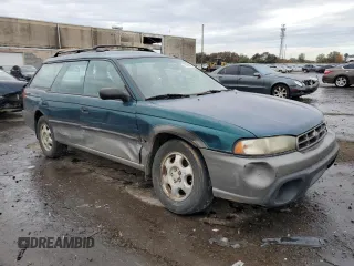 1996 Subaru Legacy Outback with VIN 4S3BG6858T7974280, listed as a Copart auction lot 78790874 with 290,480 mi miles and Salvage title. Bid and sale history available at DreamBid. Image 4.