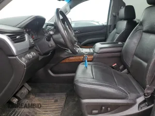 2015 Chevrolet Tahoe LTZ z VIN 1GNSKCKC5FR100084, wystawiony jako Copart lot #57677825 z przebiegiem 141 987 mil mil oraz Czysty tytuł • Clean title. Historia ofert i sprzedaży dostępna na DreamBid. Obrazek 7.