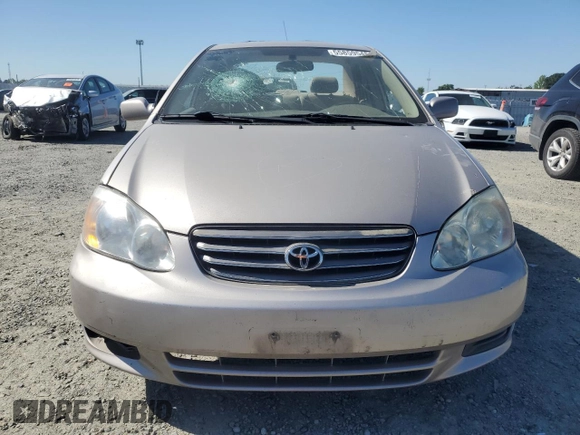 2003 Toyota Corolla CE with VIN 1NXBR38E33Z084761, listed as a Copart auction lot 55859545 with 205,938 mi miles and Salvage Title. Bid and sale history available at DreamBid. Image 5.