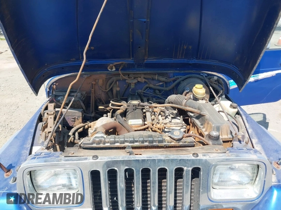 1995 Jeep Wrangler z VIN 1J4FY29S3SP213368, wystawiony jako IAAI lot #42425240 z przebiegiem 96 473 mil mil oraz . Historia ofert i sprzedaży dostępna na DreamBid. Obrazek 10.