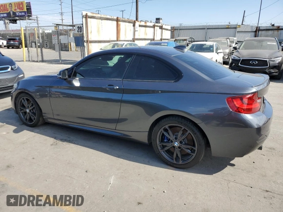 2016 BMW 2 Series M235i with VIN WBA1J7C52GV359958, listed as a Copart auction lot 65937374 with 82,231 mi miles and Salvage title. Bid and sale history available at DreamBid. Image 2.