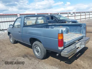 1989 Nissan Hardbody z VIN 1N6ND11S7KC338798, wystawiony jako IAAI lot #42328305 z przebiegiem 153 347 mil mil oraz . Historia ofert i sprzedaży dostępna na DreamBid. Obrazek 3.
