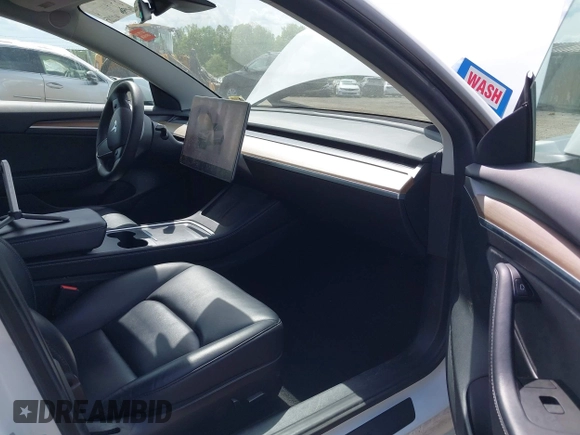 2022 Tesla Model 3 Long Range z VIN 5YJ3E1EB4NF183832, wystawiony jako IAAI lot #42085815 z przebiegiem 35 880 mil mil oraz . Historia ofert i sprzedaży dostępna na DreamBid. Obrazek 5.