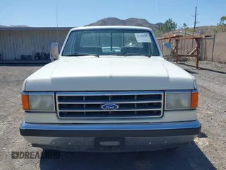 1990 Ford F-150 with VIN 2FTDF15N6LCA44303, listed as a IAAI auction lot 41981297 with 63,097 mi miles. Bid and sale history available at carsss.com. Image 6.