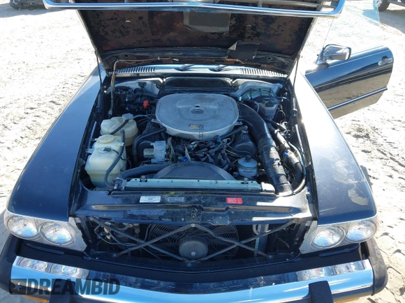 1986 Mercedes-Benz 560 SL z VIN WDBBA48D2GA055024, wystawiony jako IAAI lot #41888928 z przebiegiem 118 569 mil mil oraz . Historia ofert i sprzedaży dostępna na DreamBid. Obrazek 10.