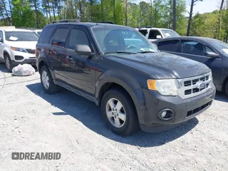 2011 Ford Escape XLT with VIN 1FMCU9DG5BKC36529, listed as a IAAI auction lot 42045682 with 141,101 mi miles. Bid and sale history available at carsss.com. Image 1.