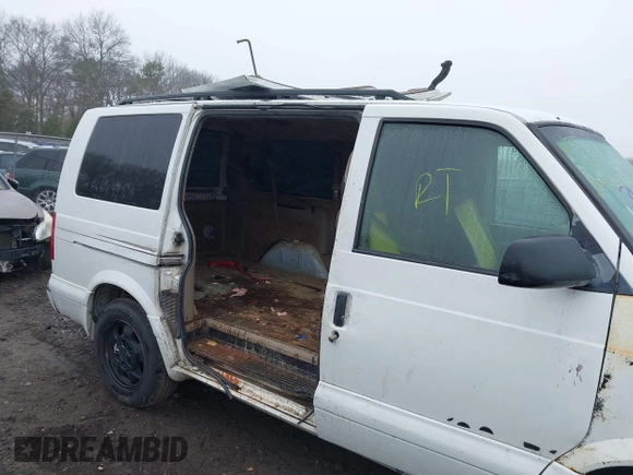2003 Chevrolet Astro with VIN 1GNDM19X63B132143, listed as a IAAI auction lot 41818208 with Not Provided miles. Bid and sale history available at carsss.com. Image 6.