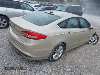 2018 Ford Fusion S z VIN 3FA6P0UU0JR157005, wystawiony jako IAAI lot #41689881 z przebiegiem Nie podano mil oraz . Historia ofert i sprzedaży dostępna na DreamBid. Obrazek 4.