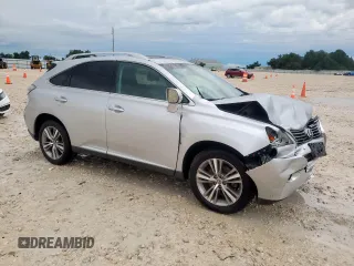 2015 Lexus RX 350 with VIN 2T2BK1BA5FC306653, listed as a Copart auction lot 60835795 with 128,574 mi miles and Salvage title. Bid and sale history available at DreamBid. Image 4.
