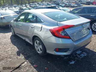 2016 Honda Civic Sedan LX with VIN 19XFC2F53GE051154, listed as a IAAI auction lot 41921524 with 101,979 mi miles. Bid and sale history available at carsss.com. Image 3.