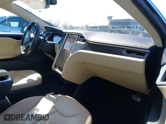 2013 Tesla Model S with VIN 5YJSA1CNXDFP28192, listed as a IAAI auction lot 42227521 with 60,967 mi miles and . Bid and sale history available at DreamBid. Image 5.