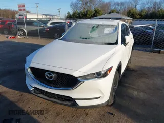 2017 Mazda CX-5 Touring with VIN JM3KFBCL8H0136601, listed as a IAAI auction lot 41830355 with 113,677 mi miles. Bid and sale history available at carsss.com. Image 18.