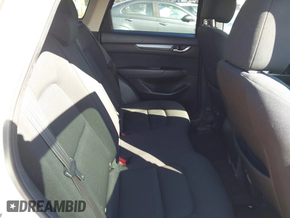 2019 Mazda CX-5 Sport with VIN JM3KFBBM0K0574255, listed as a IAAI auction lot 41661924 with 93,851 mi miles and . Bid and sale history available at DreamBid. Image 8.
