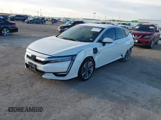 2018 Honda Clarity z VIN JHMZC5F14JC002263, wystawiony jako IAAI lot #41353651 z przebiegiem 153 401 mil mil oraz . Historia ofert i sprzedaży dostępna na DreamBid. Obrazek 17.