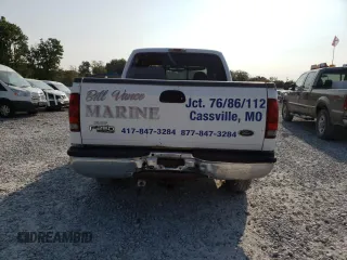2000 Ford Super Duty F-250 XL with VIN 1FTNW21F2YEE31635, listed as a Copart auction lot 69854734 with 442,635 mi miles and Salvage Title. Bid and sale history available at carsss.com. Image 6.