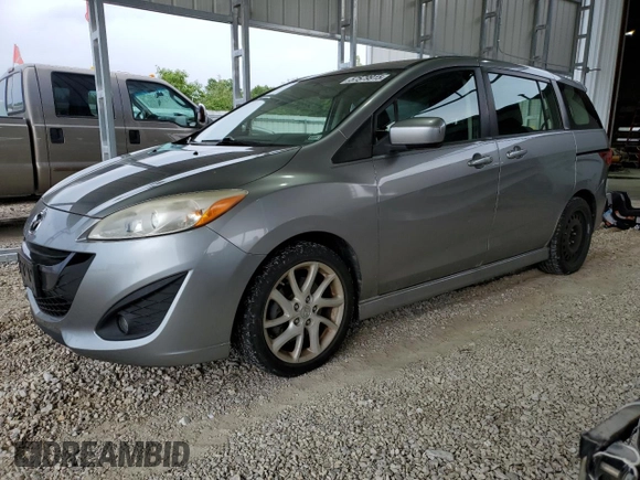 2012 Mazda 5 Touring z VIN JM1CW2CL6C0143536, wystawiony jako Copart lot #57579915 z przebiegiem 148 191 mil mil oraz Szkoda całkowita • Salvage title. Historia ofert i sprzedaży dostępna na DreamBid. Obrazek 1.