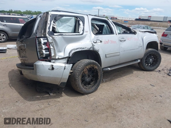 2014 Chevrolet Tahoe LT with VIN 1GNSKBE02ER147079, listed as a IAAI auction lot 42204312 with Not provided miles and . Bid and sale history available at DreamBid. Image 4.